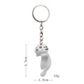 Süßer weißer Katzen Schlüsselanhänger, kreativer Taschenanhänger mit Metallring und Kette. - Einzelpreis / Liegende Katze - Weiße Katze