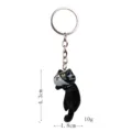 Detailaufnahme des süßen schwarzen Katzen-Schlüsselanhängers mit Maßen 4,3cm mal 1,8cm und 10g. - Einzelpreis / Liegende Katze - Schwarze Katze