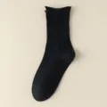 Comode calze tubolari nere in cotone da donna, classico design a costine per tutti i giorni. - Taglia unica / Nero