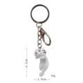 Detailansicht des niedlichen schlafenden Katzen-Schlüsselanhängers, kompaktes Harz-Accessoire. - Weiße Katze / Einzelpreis