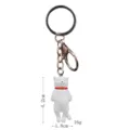 Detail view of the cute sleeping cat keychain with a white pendant and metal ring. - Sleeping White Cat