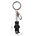 Close-up view of the cute black sleepy cat keychain with red collar, showing precise dimensions. - Sleeping Black Cat