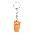 Cute cat in ice cream cone keychain close-up, detailed texture and metal ring pendant. - Yellow Open-Mouth Cat + Yellow Bucket Keychain