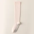 Calze sportive lunghe a compressione rosa con punti antiscivolo, ideali per fitness e yoga. - Taglia unica / Rosa chiaro