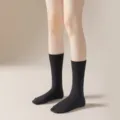 Schwarze Kompressionswadenstrümpfe für Damen, einfarbige elegante klassische Freizeitsocken. - Einheitsgröße / Schwarze Kniestrümpfe 22 cm