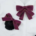 Wine red bow tie and hair net set for professional work uniform, detail view showing texture. - Red Set