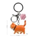 Portachiavi gatto arancione paffuto carino con ciondolo a zampa rosa e gancio in metallo. - 2ª Gen Gatto Leopardo Giallo / Zampa di gatto rosa