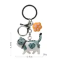 Süßer molliger Katzen-Schlüsselanhänger mit Pfoten-Anhänger, graue gestreifte Taschendeko, Metall. - Karabiner-Stil / Grau-Weiße Herzmuster Katze (Gelbe Kralle)