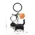 Niedlicher dicker Katzen-Schlüsselanhänger mit Pfoten-Anhänger und Karabiner für Tasche. - Karabiner-Stil / Schwarz-Weiße Katze (Gelbe Kralle)