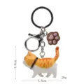 Süßer runder orangener Katzen Schlüsselanhänger mit Pfoten Anhänger Metall Karabiner - Karabiner-Stil / Gelb-Weiße Getigerte Katze (Braune Kralle)