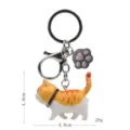 Süßer orangefarbener Katzen-Schlüsselanhänger mit Pfoten-Anhänger und Metallkarabiner. - Karabiner-Stil / Orange-Weiße Getigerte Katze (Graue Kralle)