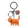 Simpatico portachiavi gatto arancione cicciottello con ciondolo zampa per borsa e zaino - 2ª Gen Gatto Leopardo Giallo / Zampa Caffè