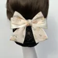 Floral hair bow net for professional nurses and service staff, elegant beige bun cover. - Minimalist Style / Coarse Net / Small Yellow Flower
