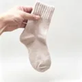 Beige knitted mid-tube socks detail shot, soft texture with ribbed cuff for daily comfort. - Size 35-40 / Rabbit Wool Blend Beige