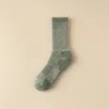 Detalle de primer plano de calcetín de lana térmica grueso con punto de soporte de arco. - Talla única / Verde Militar