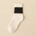 Detailansicht kuscheliger Fleece-Schlaf-Socken, weiche warme Thermosocken für zu Hause. - Einheitsgröße / Beige