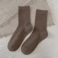 Cozy brown mid-tube socks for women, simple solid color winter wool warm casual wear. - One Size / Coffee