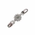 Closeup of a silver tone sunflower cardigan clip with duckbill clips for shawls and scarfs. - Style 3
