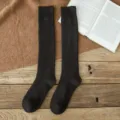Calze lunghe invernali spesse da donna, calzettoni alti neri in cotone termico confortevole. - Taglia unica / Nero