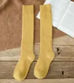 Calze lunghe invernali gialle calde e spesse in morbido cotone da donna variante. - Taglia unica / Giallo