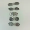 Close up view of exquisite electroplated leaf cardigan clips, detailed metal clothing buckle. - Antique Silver 5-Piece Set