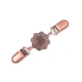 Close-up detail shot of vintage antique copper hollow floral cardigan clip accessory. - 912-3