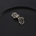 Clip per scialle vintage in strass bronzo, elegante fermaglio per cardigan da donna. - Colore scuro (lunghezza 55 mm)