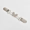 Close-up detail of the elegant pearl and rhinestone cardigan clip, featuring metal clasps. - Small Butterfly Pearl Style