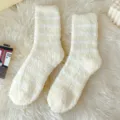 Detail view of cozy fluffy striped fleece socks, soft texture and warm sleep socks design. - One Size / Light Yellow