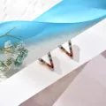 Chic V-shaped letter stud earrings featuring colorful crystal rhinestones and gold tone. - Letter V