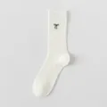 White Cotton Mesh Crew Socks featuring Delicate Black Bow Embroidery Style Variant Item - One Size / Cream White