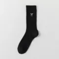 Black mid-calf socks for women featuring cute white bow embroidery, soft and breathable cotton. - One Size / Black