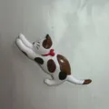 Nahaufnahme des streckenden Glückskatzen Hakens mit lebendigen Farben und feiner Textur. - Streckende Calico-Katze (12)