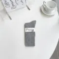 Chaussettes mi-hautes côtelées grises pour femmes, chaussettes d'automne confortables et chic. - Taille unique / Chaussettes mi-mollet / Gris clair