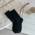 Black cable knit women socks with white contrast rolled cuff, cozy winter warm mid-calf hosiery. - One Size / Black