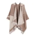 Close-up detail of the stylish color-block cape featuring delicate fringe and soft texture. - Khaki