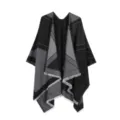 Detailed view of black and gray geometric patterned knit cape shawl with elegant fringe accent. - Black and Gray