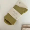 Women solid color mid-calf casual socks with paper packaging, breathable daily wear stretch socks. - One Size / Rock Green
