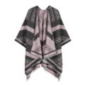 Detailed close-up of the elegant women's jacquard paisley poncho cape with stylish fringe trim. - Gray