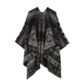 Detailed view of black ethnic knit poncho cape, stylish winter warm outerwear apparel. - Black and Gray