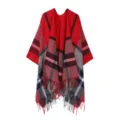 Detailed view of the red plaid leopard print tassel cape, soft knit texture and fringe hem. - Red