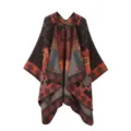 Close-up view of the intricate geometric pattern and ethnic design on the warm women cape. - Shawl / Coffee