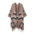 Detailed view of the stylish women's fringed plaid cape with classic striped design. - Tops / Camel