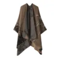 Detailed view of the stylish women's knitted shawl, showing the soft texture and reversible pattern. - Khaki