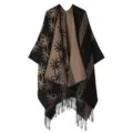 Detailed view of women's autumn winter reversible knitted cape shawl with fringe patterns. - Large Flocked Floral - Black & Khaki