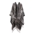 Detailed view of the stylish grey plaid knitted cape with fringe tassels for women. - Dark Gray