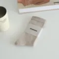 Chaussettes mi-hautes unies pour femmes, style quotidien simple et confortable. - Taille unique (chaussettes en vrac sans bandeau) / Gris Mauve