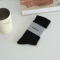 Chaussettes mi-mollet noires classiques avec emballage simple, vêtement décontracté. - Taille unique (chaussettes en vrac sans bandeau) / Noir