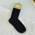 Chaussettes mi-hautes côtelées noires pour femmes décontractées respirantes style basique - Taille unique / Noir