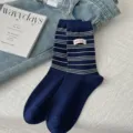 Chaussettes mi-hautes à fines rayures rétro américaines avec étiquette, chaussettes tendance. - Taille unique / Rayures bleu marine et blanches